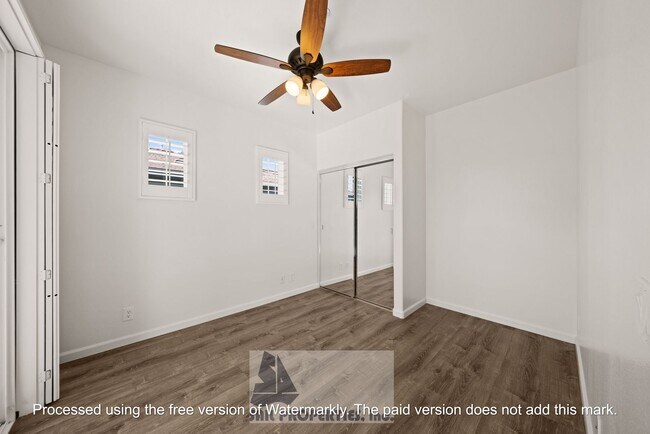 Building Photo - Welcome to this stunning 2-bedroom condo in gated community