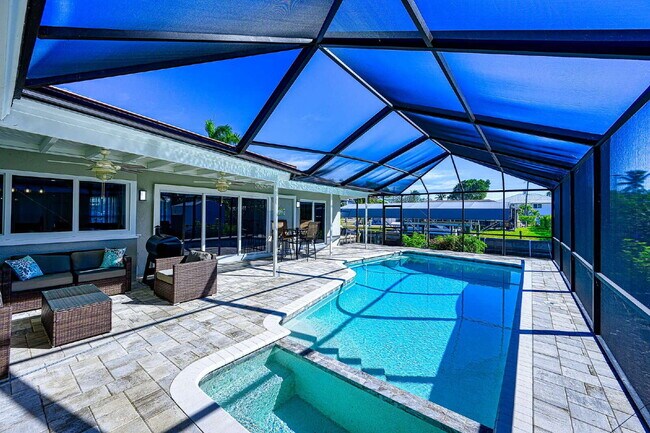 Building Photo - Waterfront Furnished Pool Home with Gulf & Canal Views in Estero Bay Shores
