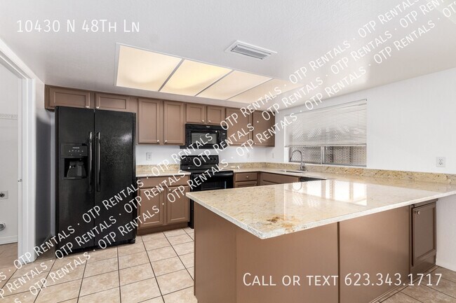 Building Photo - 10430 N 48th Ln