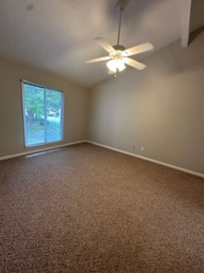 Building Photo - Live the Coastal Dream in This Stylishly U...