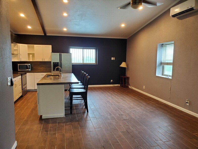 Use the island for dining or set up a table/chairs - 2701 Blue Mound Rd W