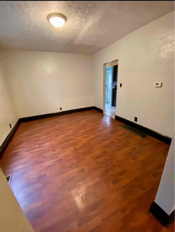 Building Photo - 813 11th St W