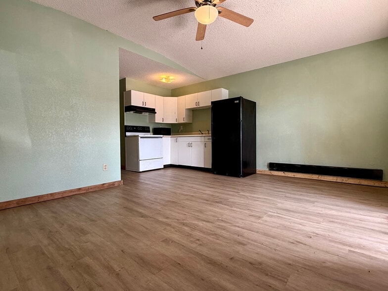 Living room with fan - 377 AR 56 Hwy