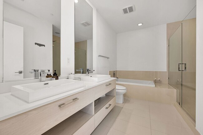 Building Photo - Remarks:	Enjoy stunning Skyline and Bay views from the wraparound balcony of this furnished 2-bed...