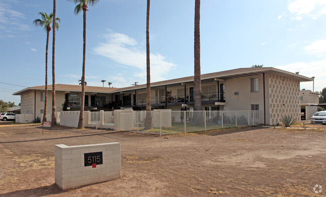 Building Photo - MODERN UPTOWN APARTMENTS