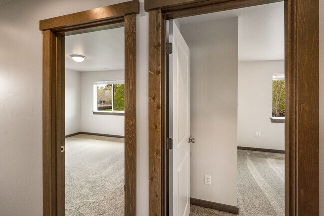 Building Photo - Pet Friendly! Gorgeous 3 Bedroom condo with double stall attached garages with AC.