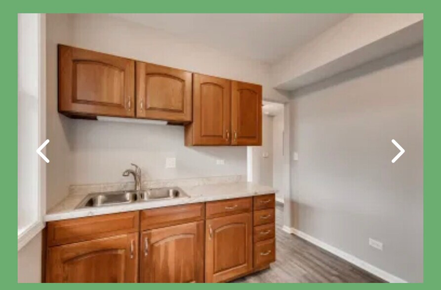 Building Photo - 7342 S Vernon Ave
