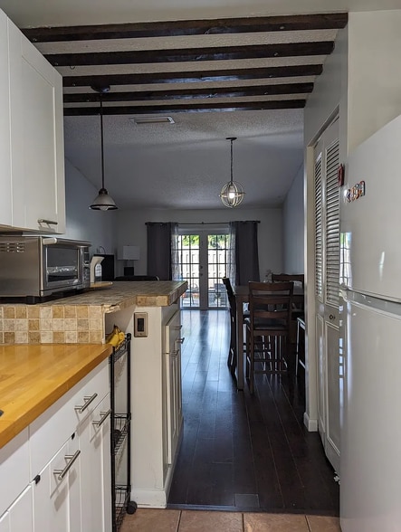 Kitchen looking out to the living room dining room - 13928 SW 52nd Ln