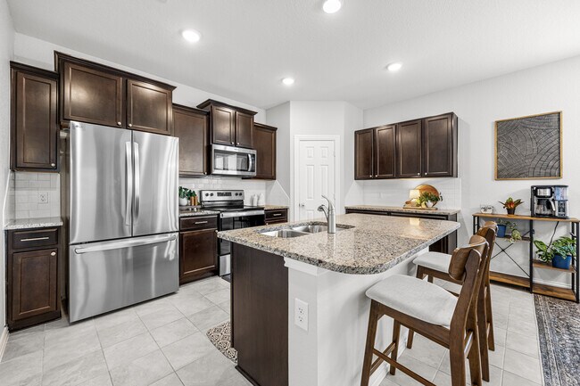 Building Photo - 8706 Hidden Oaks Dr