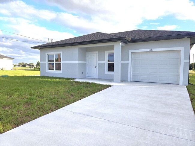 Building Photo - Brand-New 2/2/1 -SW Lehigh Acres-See this ...