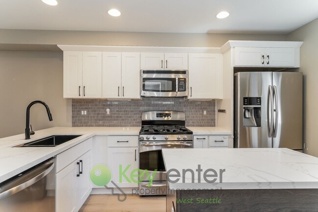 Building Photo - **Rent Special** Modern 3 Bedroom with Off...