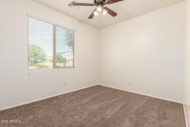 Building Photo - 9883 W Harmony Ln