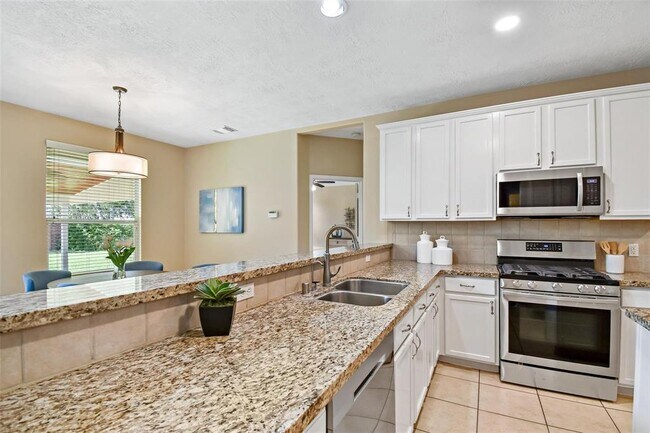 Building Photo - 8019 Spring Bluebonnet Dr