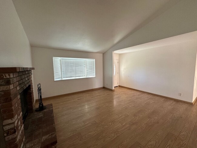 Building Photo - Your Dream Home: Spacious Interiors, Garage, and Huge Backyard