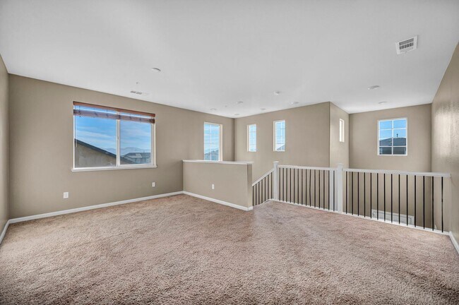 Building Photo - Sun-Filled, Spacious Living with a Three-Car Garage