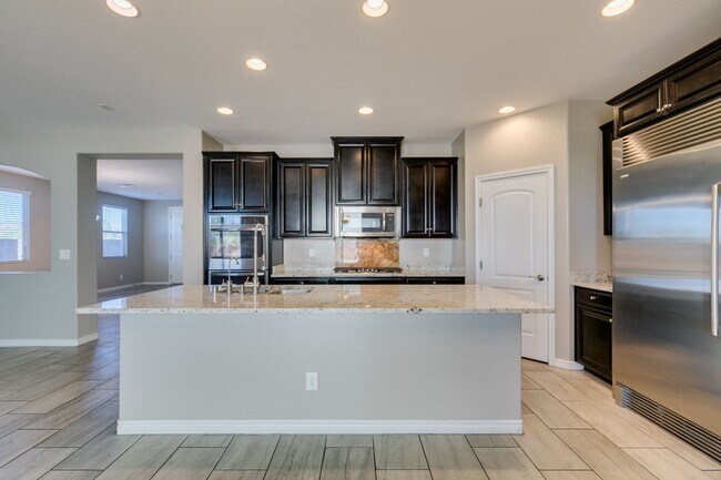 Building Photo - Beautiful Next-Gen Home with Private Entry Suite & Spacious Backyard