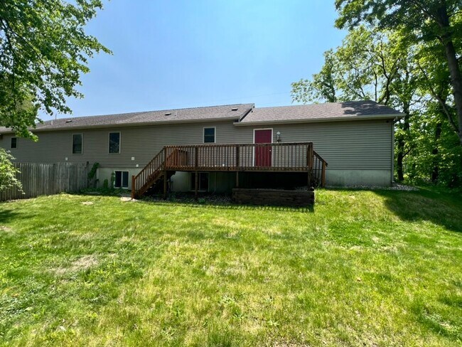 Building Photo - Spacious 3BR Duplex with Finished Basement & 2-Car Garage in Otsego