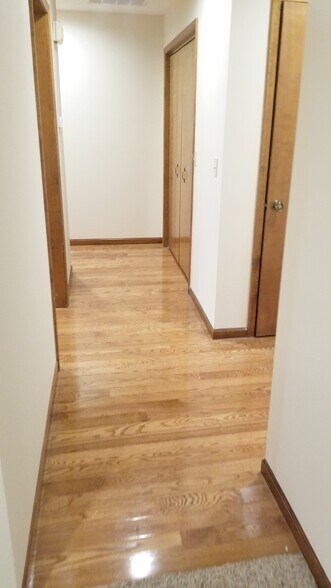 Hardwood flooring in the hallway - 1414 E Powell St