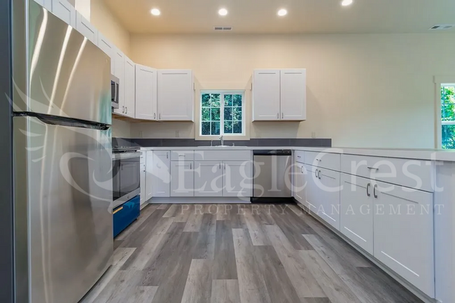 Building Photo - Remodeled Four Bedroom House Located Near ...