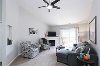 Spacious, inviting living room at Compass Pointe—perfect for relaxing or entertaining in style. - Compass Pointe Apartments