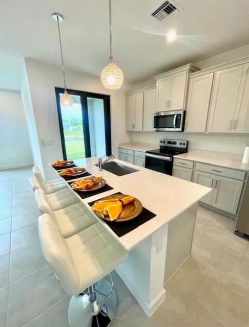 Building Photo - 14043 SW Thorens Dr