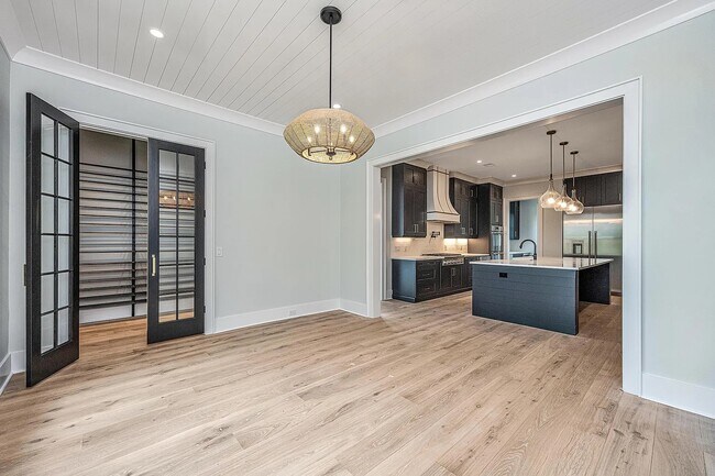 view from dining into kitchen - 3584 Henrietta Hartford Rd