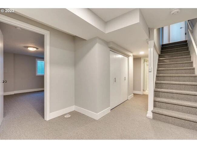 Building Photo - Stylishly Updated Mid-Century Gem on a Qui...