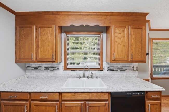 Building Photo - Spacious 4BR with Beautiful Backyard Retreat!