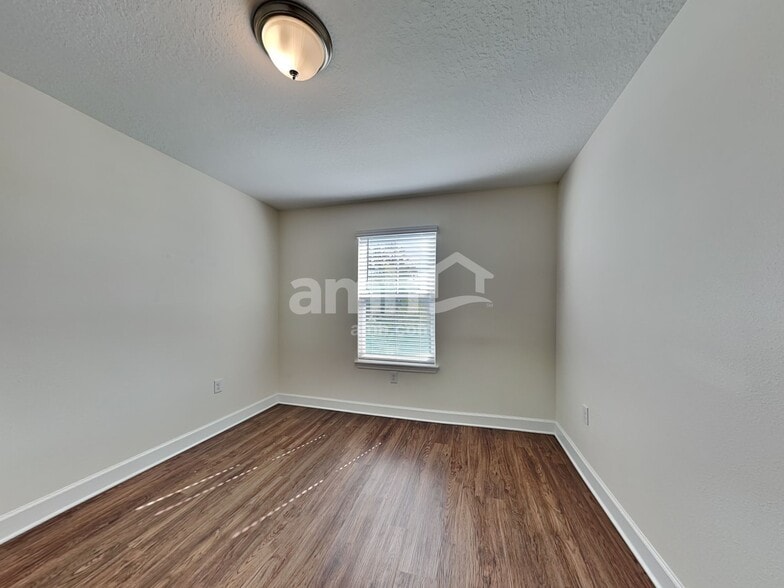 Building Photo - 6605 Hidden Rose Pl