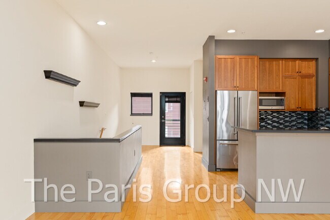 Building Photo - Exceptional 2 Story CapHill Condo * 2 Pkg Spaces, EV Charger & Rooftop Views