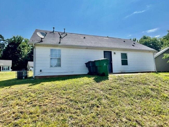 Building Photo - This lovely three bedroom two bath home is...