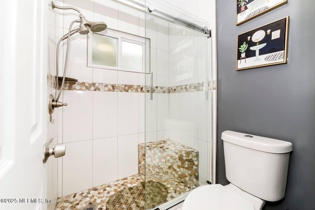 Building Photo - 7119 Swamp Flower Dr N
