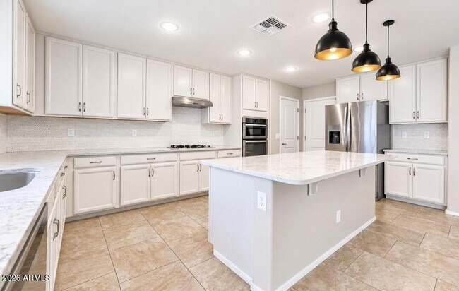 Building Photo - 12108 W Range Mule Dr