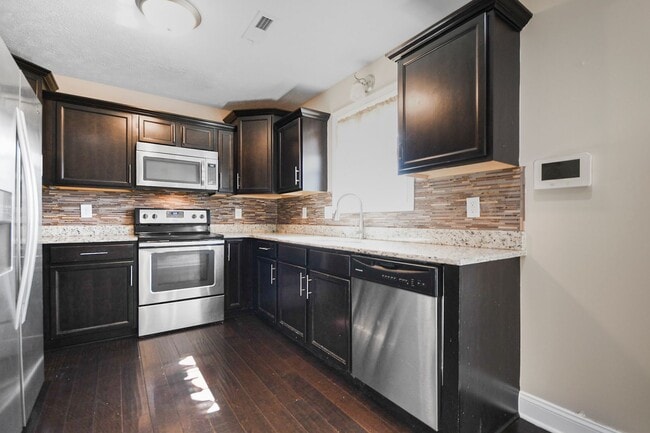 Building Photo - Pet Friendly Four Bedroom with Basement!