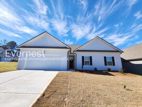 Building Photo - 4-Bedroom Home with Attached Garage / Pet-Friendly / Coming Soon!