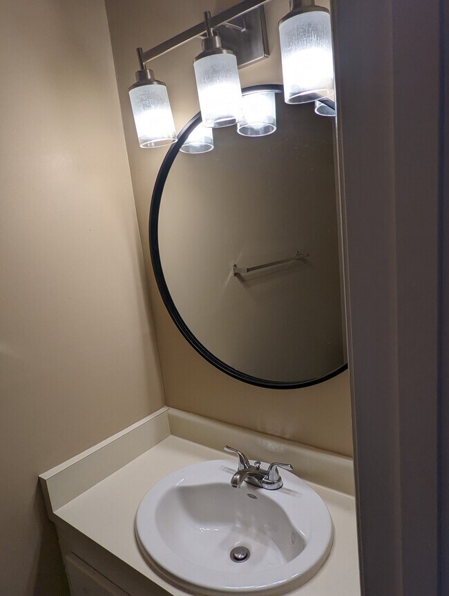 Half bath downstairs - 215 Woodburn Club Ln