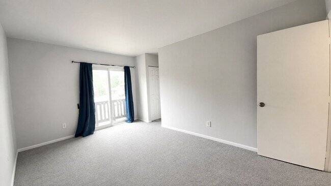 Building Photo - Spacious 3-Bedroom Norfolk Townhome with In-Unit Laundry and Fenced Outdoor Space