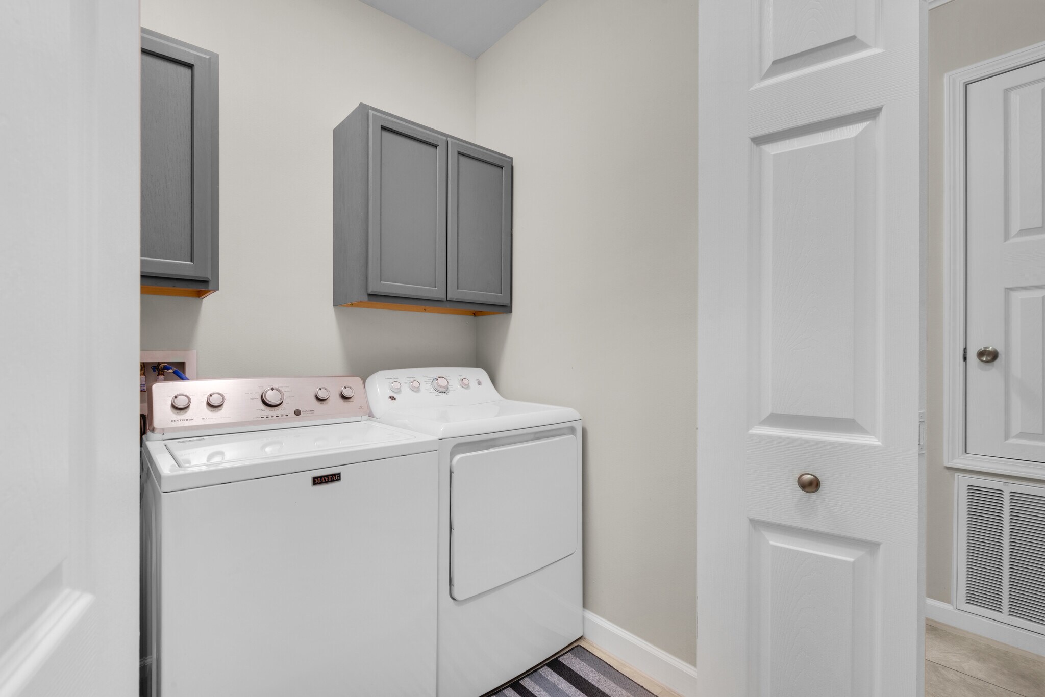 In-unit laundry with iron, ironing board, vacuum, and mop - 28 Snook Rd