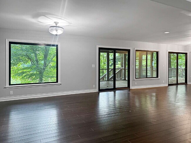 Building Photo - Modern Lake Lanier Retreat | 3BR/3.5BA | Private Swim Dock