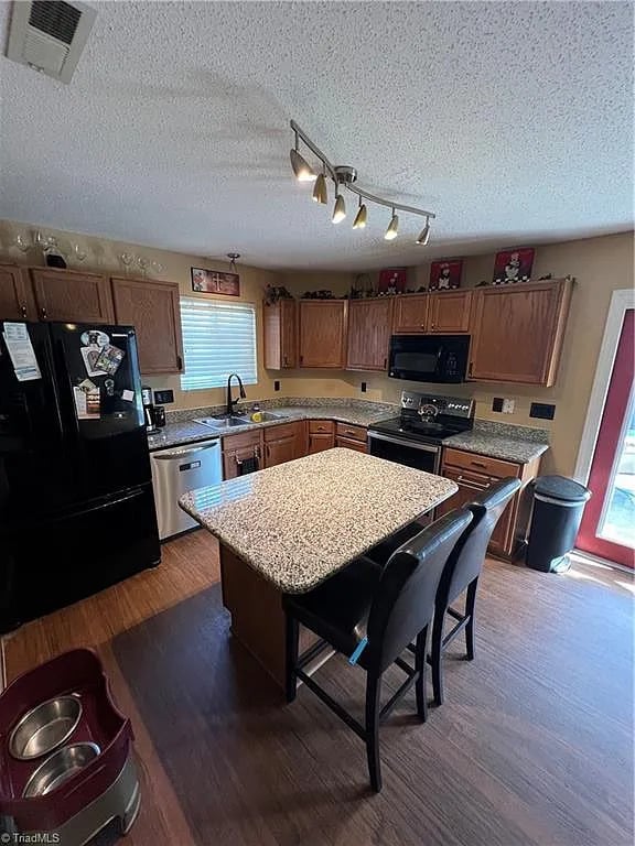 Building Photo - Earn Wealth While Leasing - Like a Homeown...