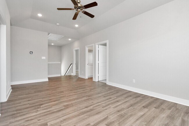 Building Photo - Welcome to the Holly — Spacious Comfort, Modern Style.
