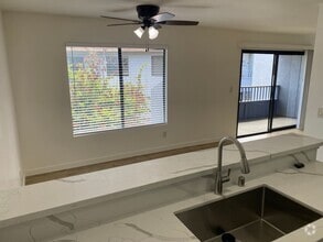Building Photo - 2BR/2BA Upstairs Condo with Two-Car Garage