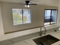Building Photo - 2BR/2BA Upstairs Condo with Two-Car Garage