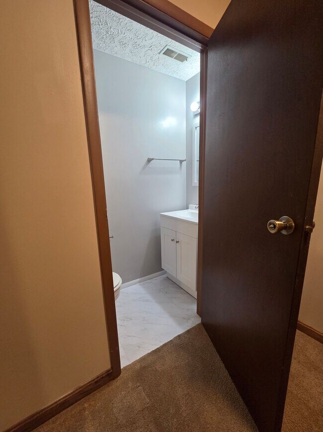 Building Photo - Serene Living in a Quiet Lakeside Community