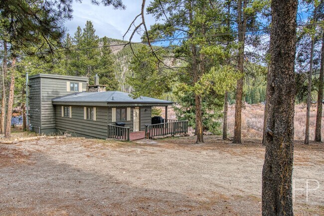 Building Photo - On the Blue River!  HUGE 4 Bedroom home, Furnished Updates throughout!  Bus route!  Spacious parking