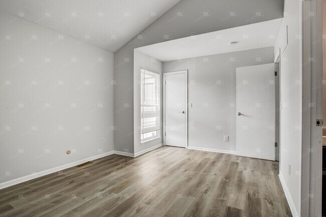 Building Photo - **Spacious 3-Bedroom Townhome with Partially Finished Basement and Off-Street Parking**