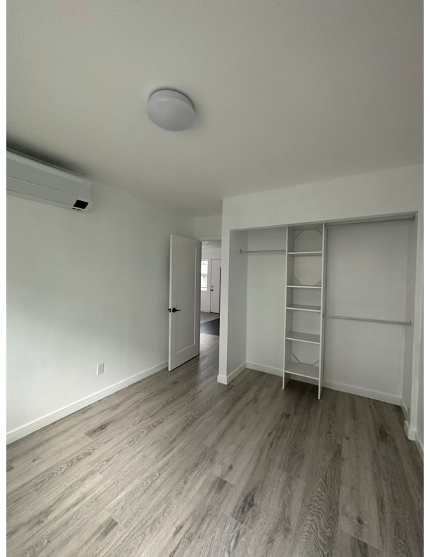 Bedroom with closet organizer. AC & Heater in room. - 2148 Felspar St