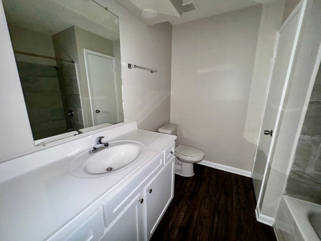 Building Photo - Charming 3BR/2BA Near Southwind | Soaring Vaulted Ceilings, Brick Fireplace & Fenced Yard