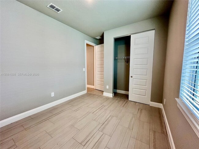 Building Photo - 9035 Dahlia Cir
