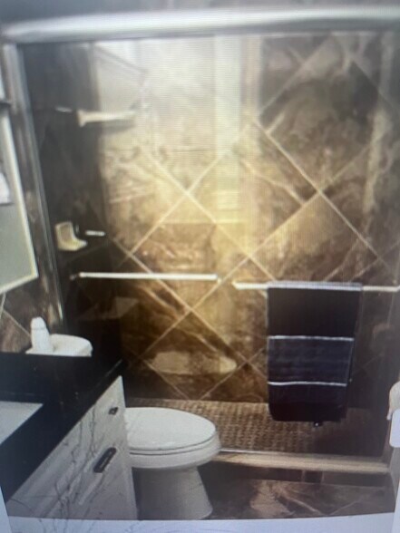 Shower bathroom by quest room - 1706 Bikini Ct